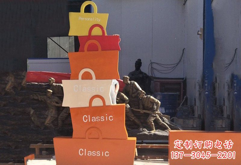 南阳不锈钢商场抽象购物袋雕塑