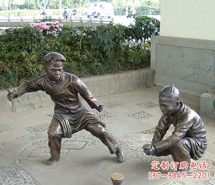 南阳打陀螺的儿童铜雕