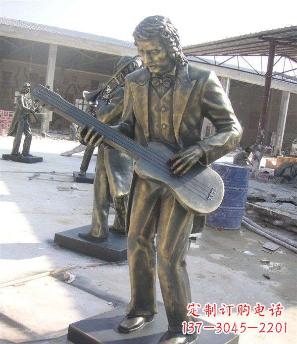 南阳西方人物铜吉他雕塑