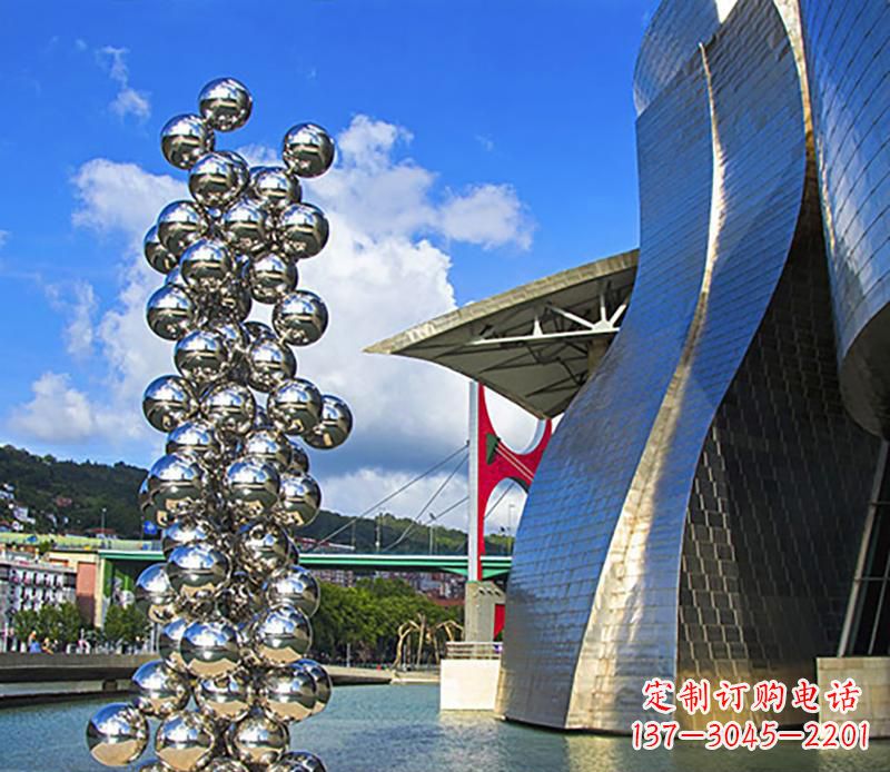 南阳高端不锈钢抽象龙柱雕塑