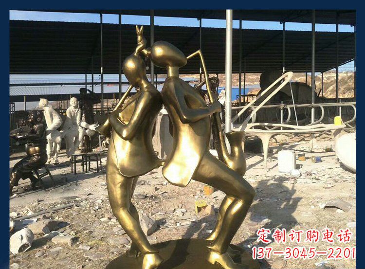 南阳广场铜雕贴金吹萨克斯人物雕塑
