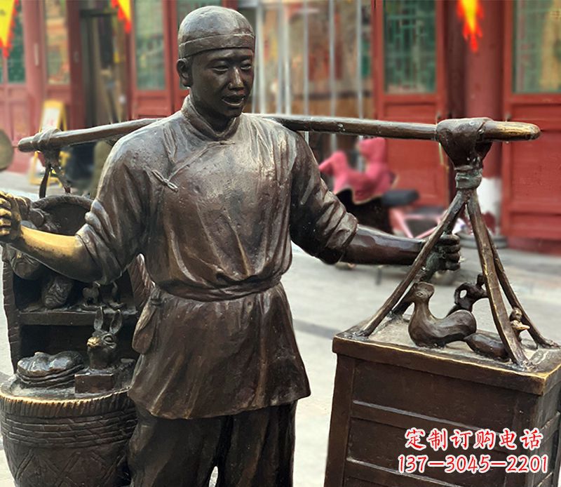 南阳铜雕步行街卖货郎人物雕塑