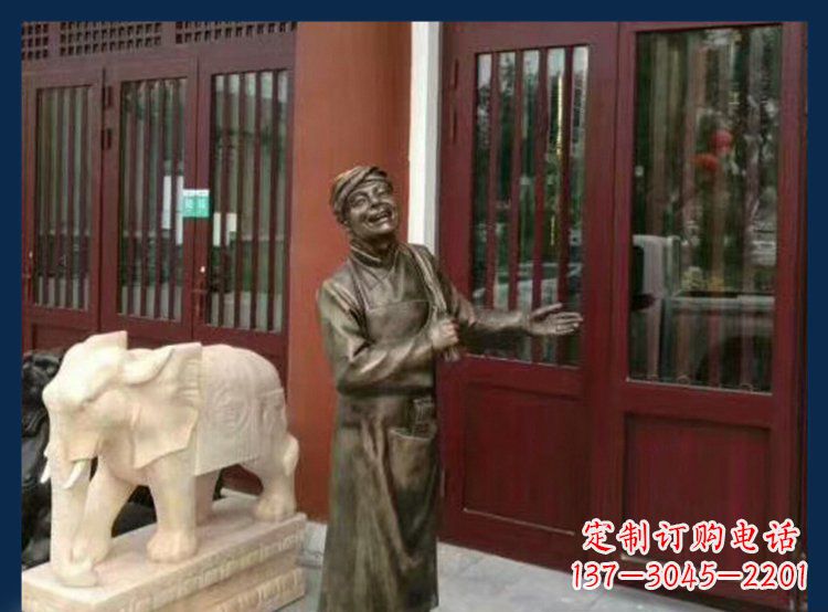 南阳铜雕店小二酒店迎宾人物雕塑