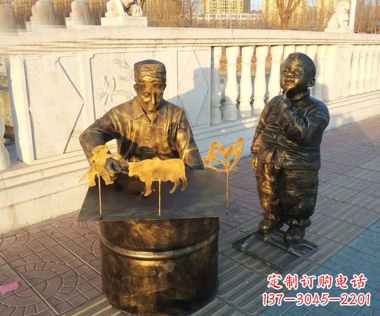 南阳铜雕画糖人的人物
