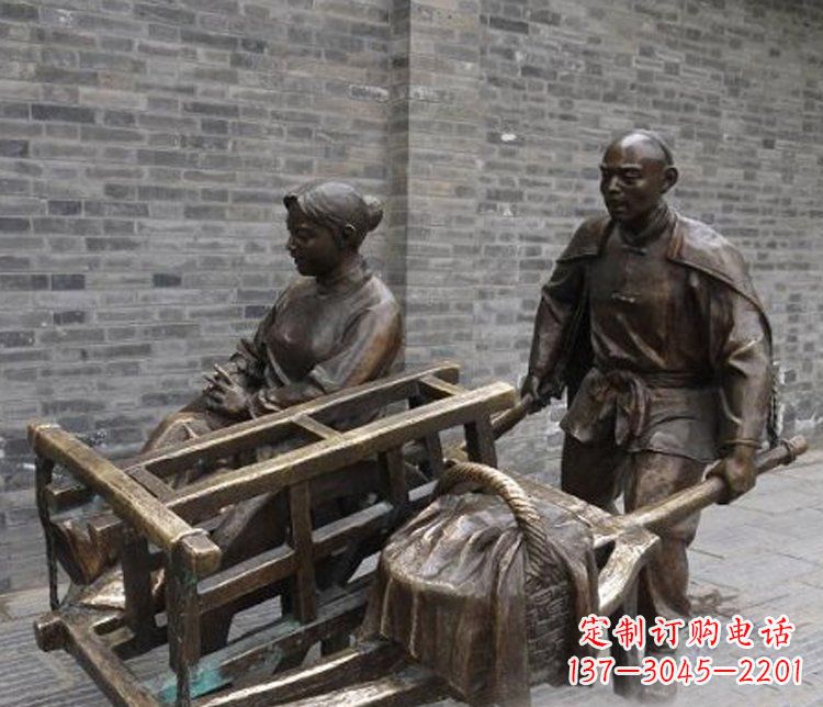 南阳推独轮车的人物铜雕