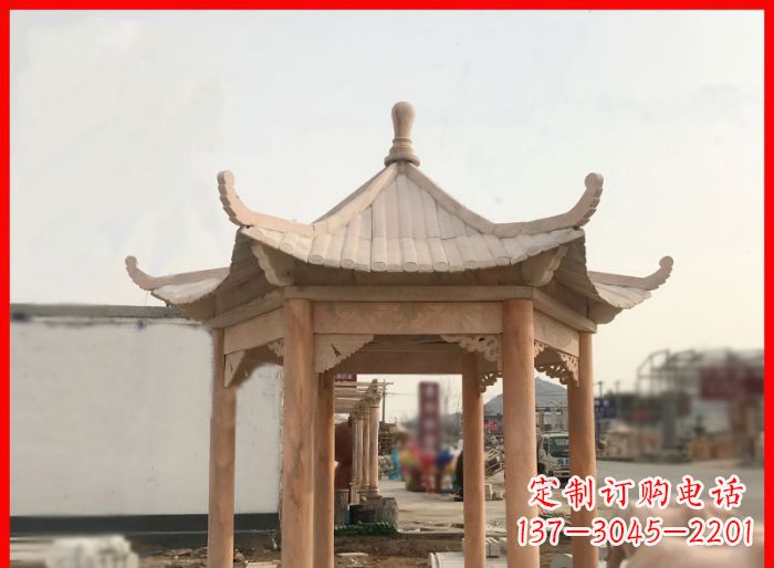 南阳晚霞红公园六角石雕凉亭