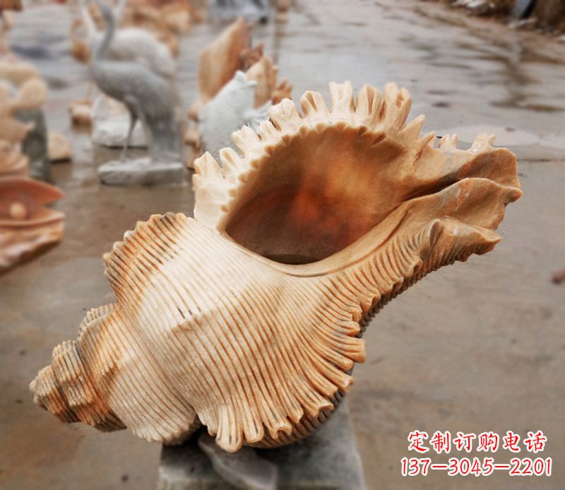 南阳晚霞红海螺石雕广场景观雕塑