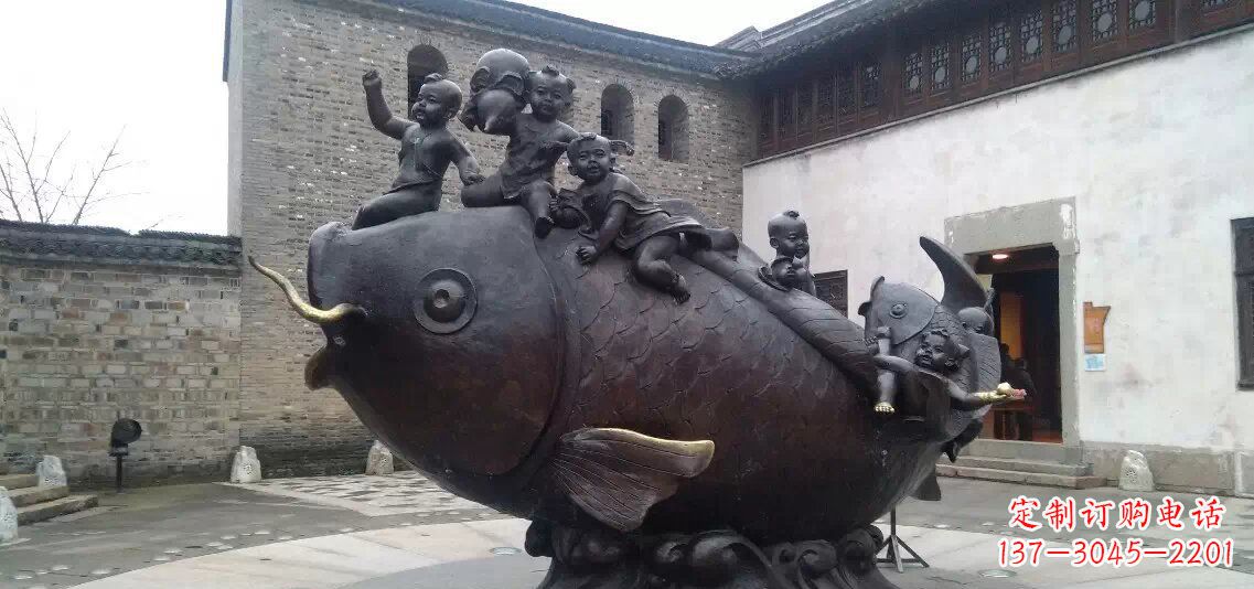 南阳小孩骑鱼铜雕