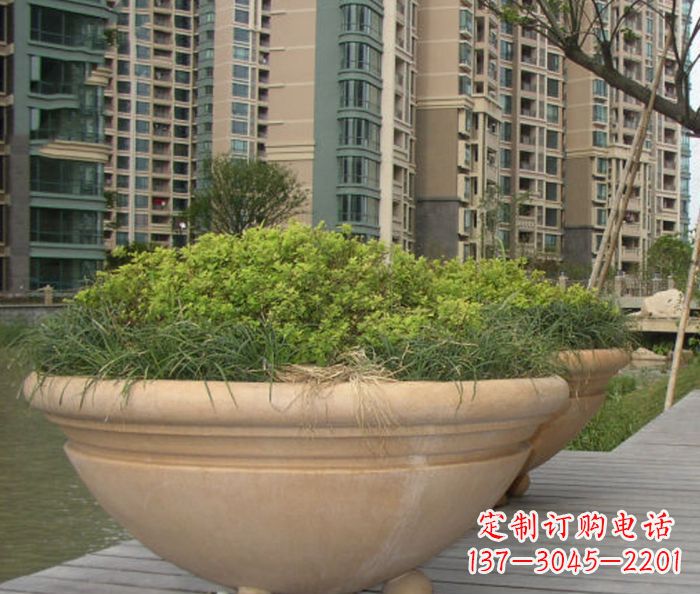 南阳小区景观晚霞红花盆石雕