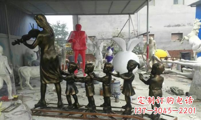 南阳校园老师和儿童铜雕